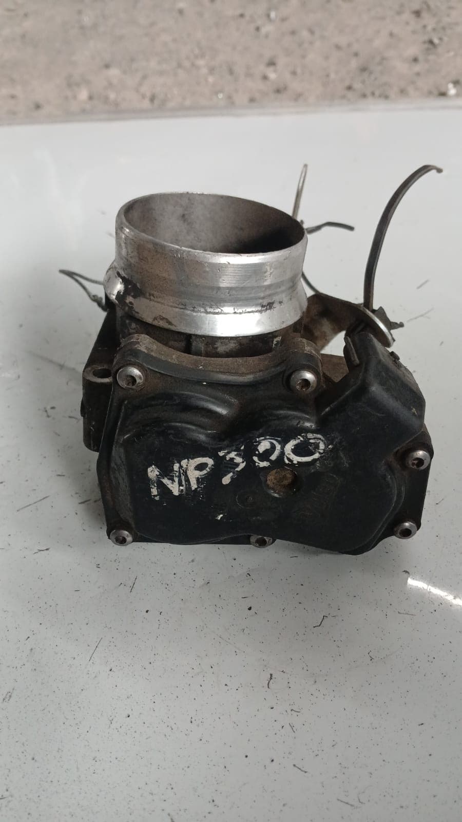 Cuerpo de aceleración Nissan Np300